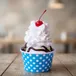 Hot fudge sundae with whipped cream and a cherry