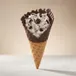Oreo flurry served in a chocolate dipped homemade waffle cone